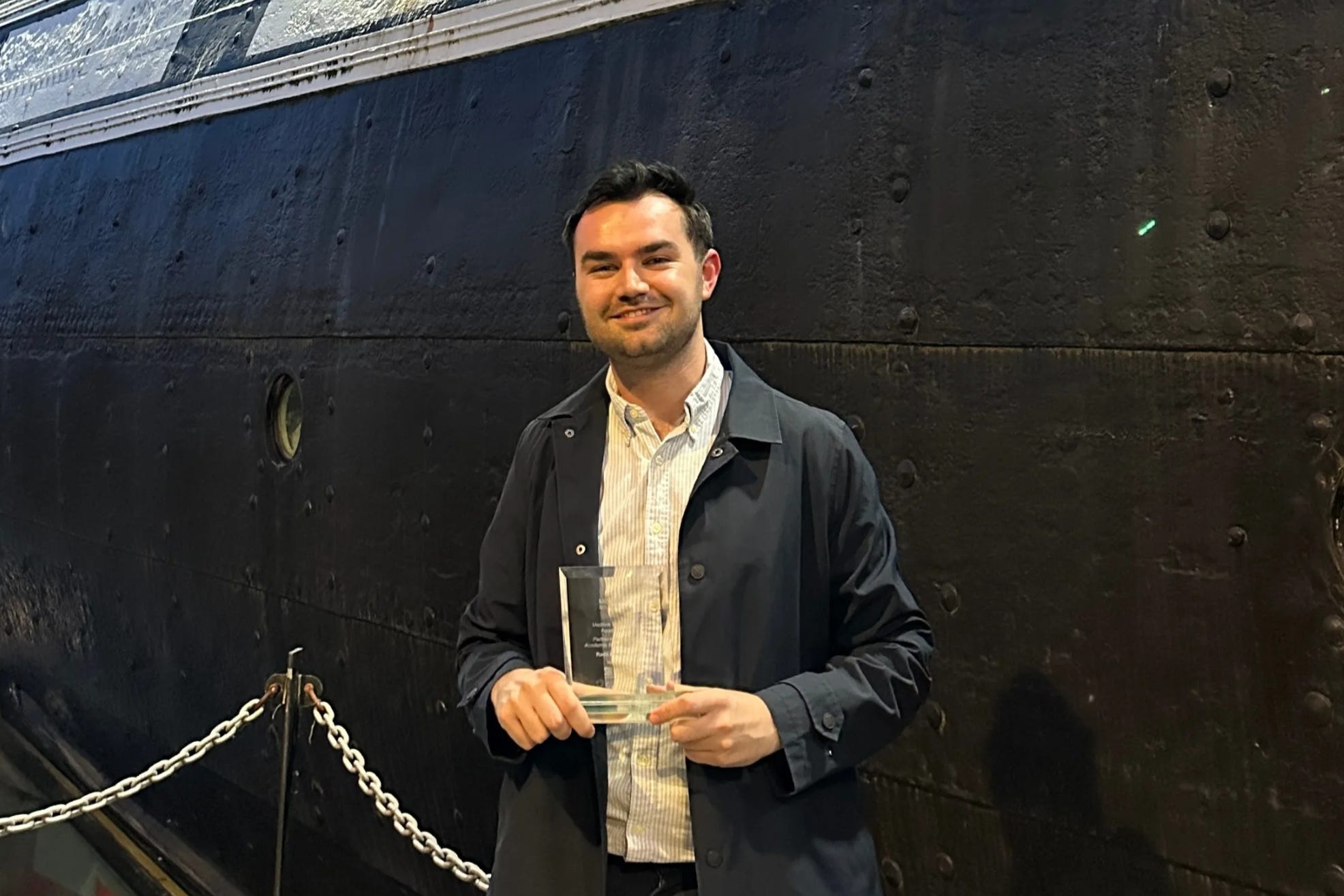 Joshua Steer with Medilink UK South West Award for Partnership between Academia & Business